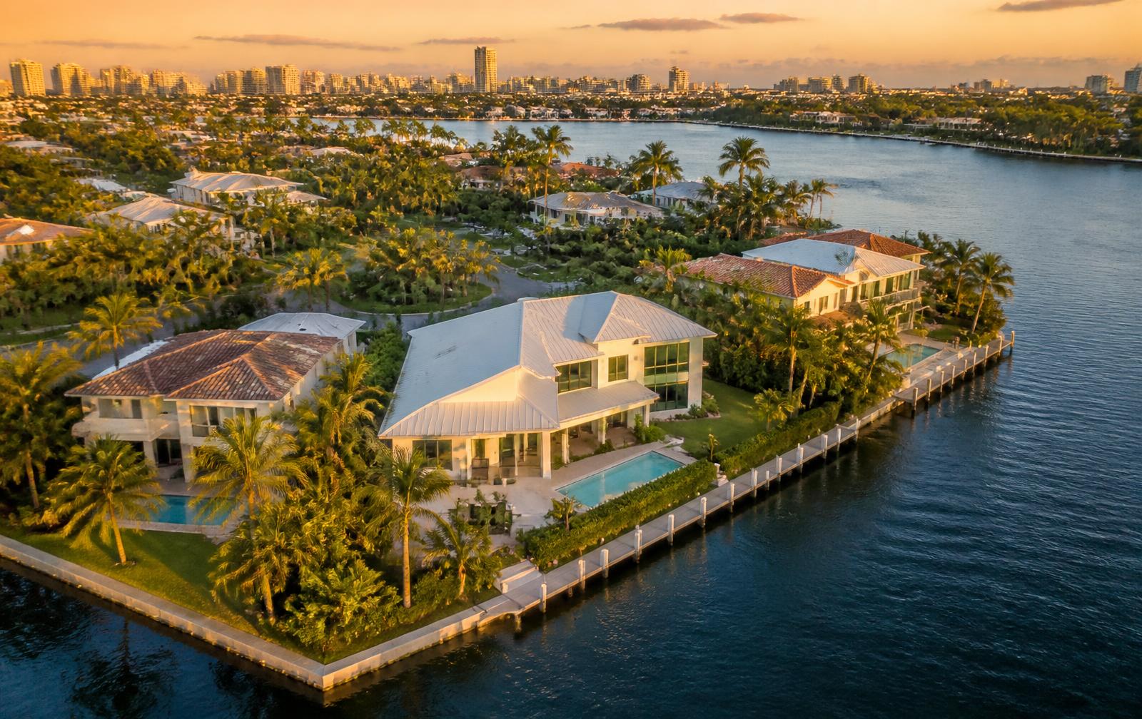 Aerial view of a South Florida waterfront neighborhood at sunset