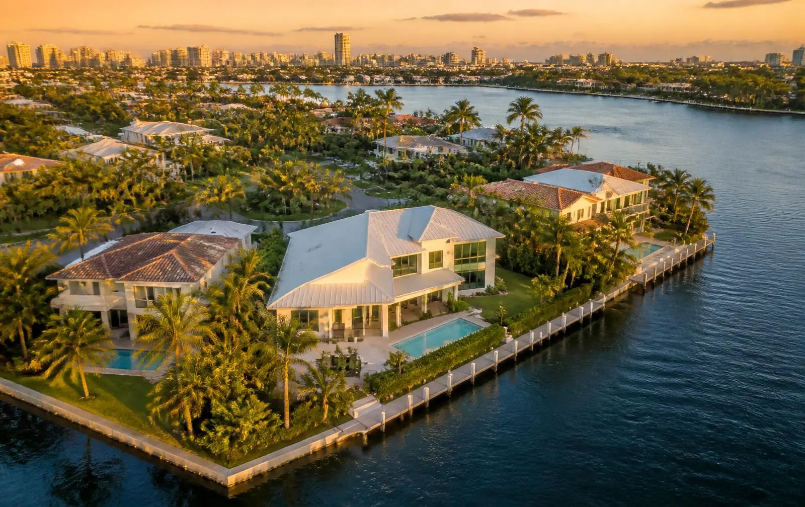 Aerial view of a South Florida waterfront neighborhood at sunset